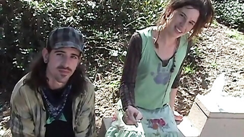 Homeless hippie couple humping for cash in public