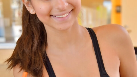 Attractive babe with puffy tits Nina shows off fresh pussy & ass and sexy feet