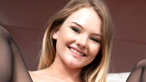 Alluring teen Dani Lynn toying her meaty pussy with a vibrator in stockings